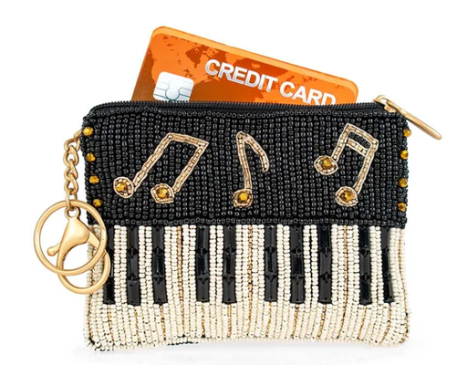 Play it Again Coin Purse Eye catching butterfly coin bag with bold beadwork floral patterns playful tassel key ring and zipper closure perfect for small essentials