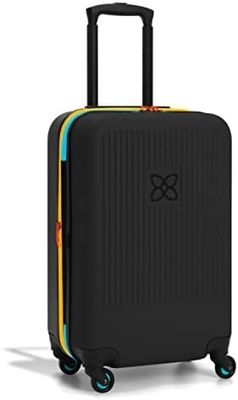 Устойчивый чемодан с антиразбивающей внешней сетчатой компрессионной панелью и компрессионным ремнем, предназначенным для беззаботного передвижения