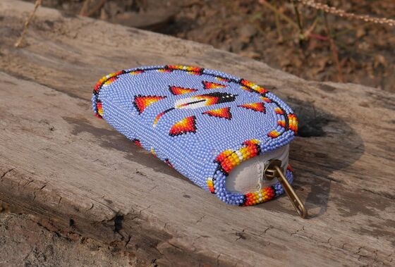 Handmade Coin Bag made of Cz Glass Seed Beads and leather designed to hold coins cosmetics and small essentials securely