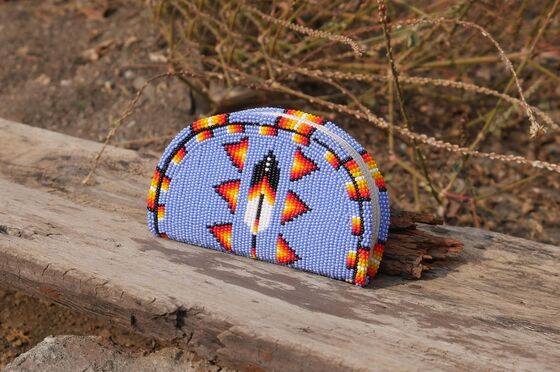 Handmade Coin Bag made of Cz Glass Seed Beads and leather designed to hold coins cosmetics and small essentials securely