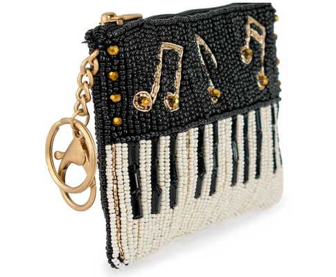 Play it Again Coin Purse Eye catching butterfly coin bag with bold beadwork floral patterns playful tassel key ring and zipper closure perfect for small essentials